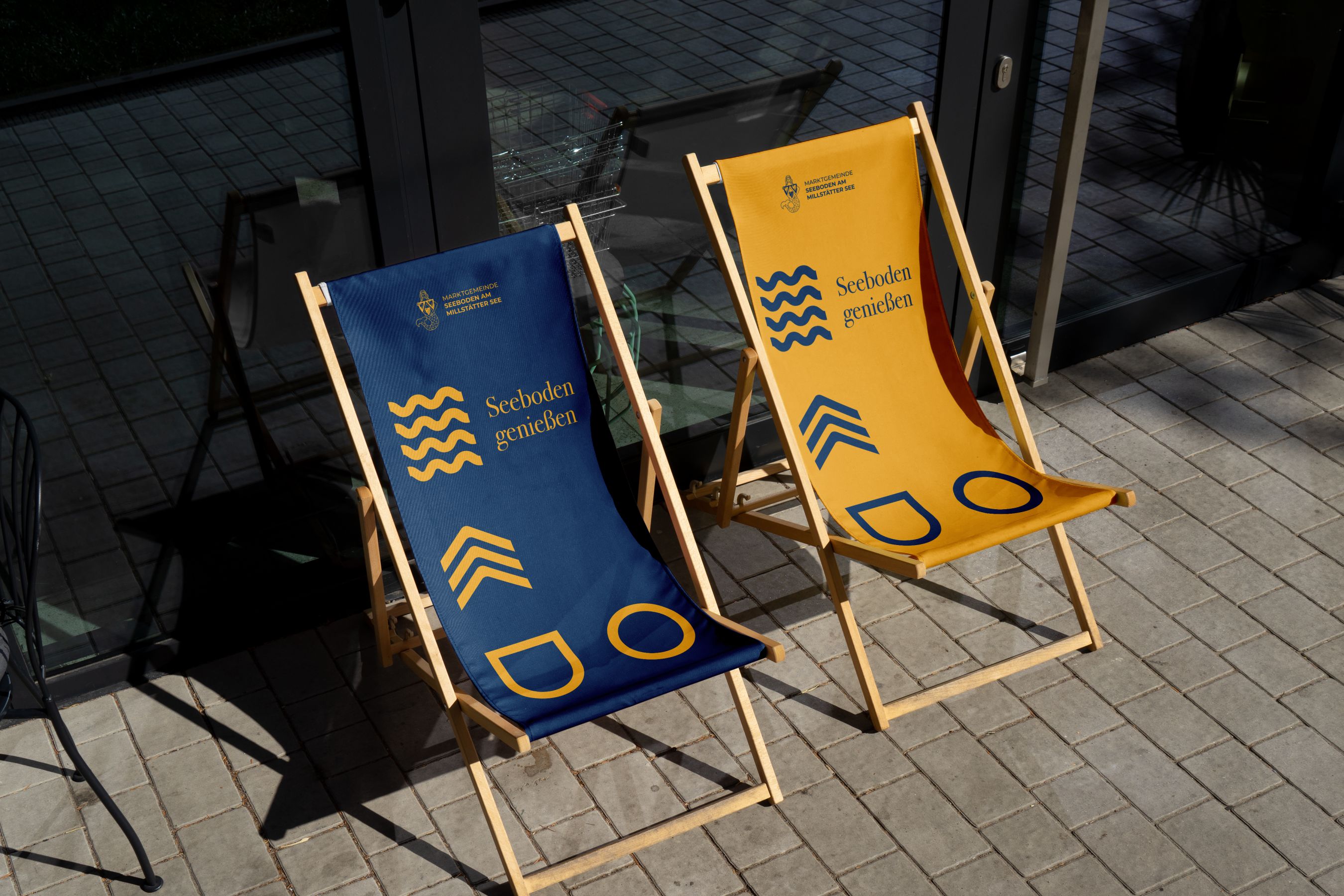 Das Logo der Seeboden Chronik in Gold hinterlegt mit pinker Aufschrift.
